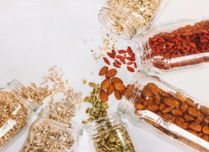 Photo of various seeds pouring.